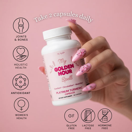 Hand holding a My Spell supplement Platinum Turmeric bottle labeled 'My Golden Hour Spell' on a pink background with health benefits listed.