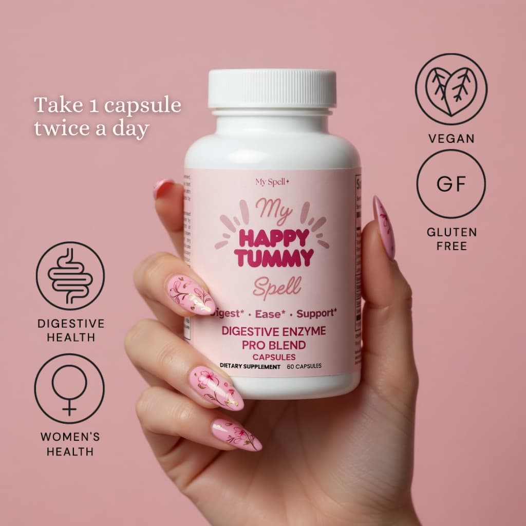 Hand holding a bottle of My Spell Supplements 'My Happy Tummy Spell' capsules with product details on a pink background