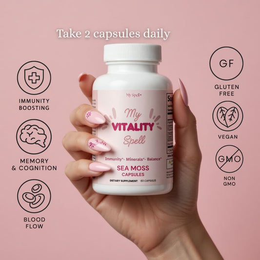 Hand holding a bottle of My Spell Supplements Sea Moss Capsules 'My Vitality Spell' Sea Moss Capsules with product details and features on a pink background